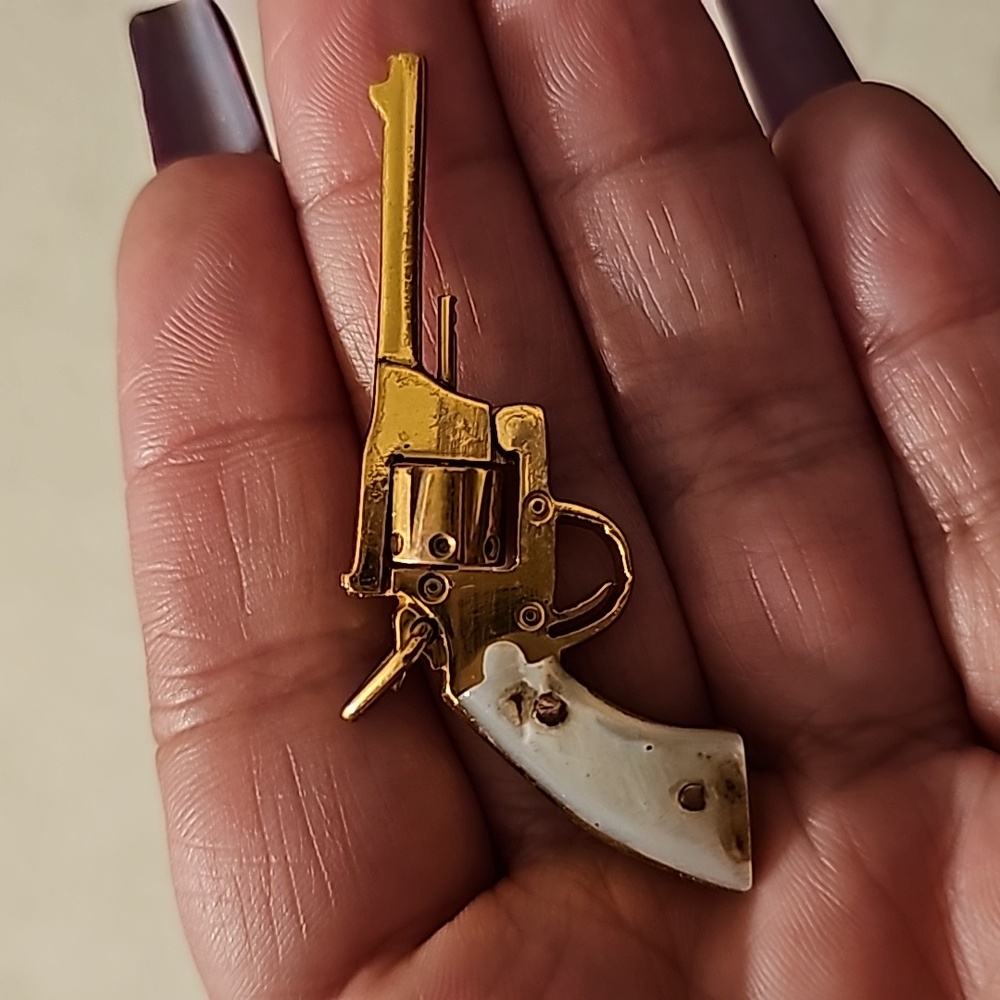 Gold filled pistol